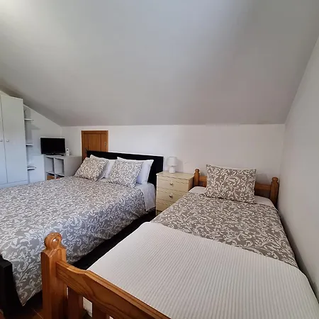 Quarto em Acomodações Particulares Cantinho Do Mel